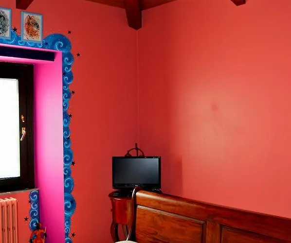 Casa De Baixo מלון לוגו