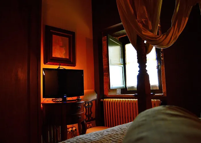 Casa De Baixo מלון לוגו