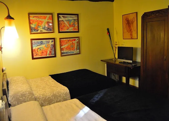 Casa De Baixo מלון לוגו